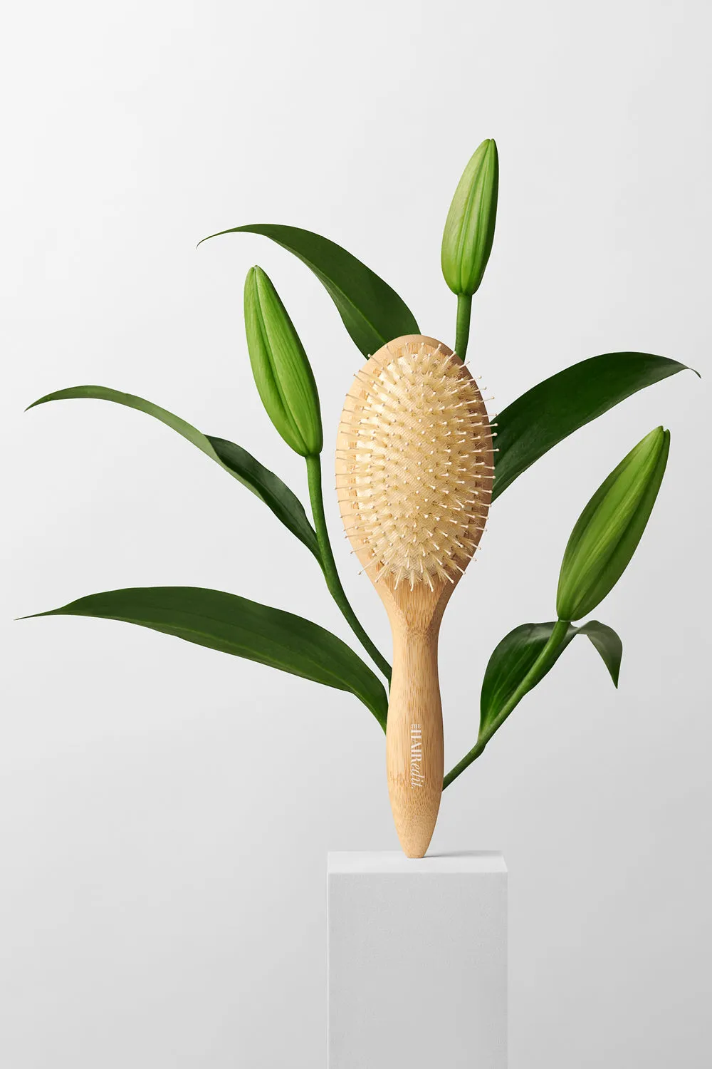 The Glossifier Boar Bristle Bamboo Brush