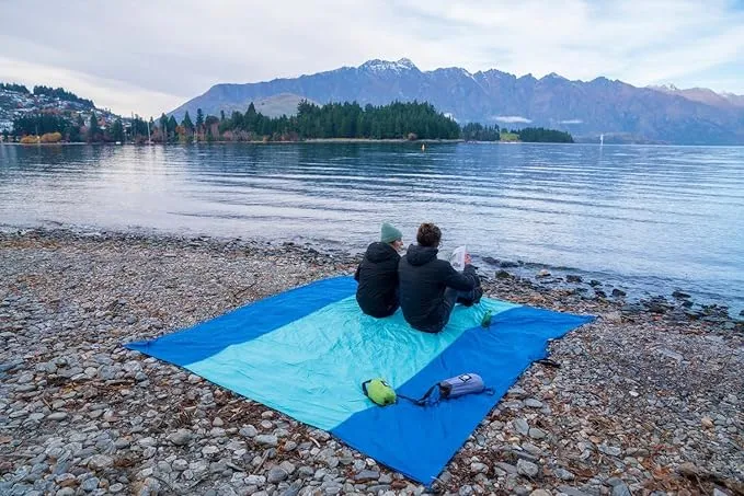 WEKAPO Beach Blanket Sandproof, Extra Large Beach Mat, Big & Compact Sand Free Mat Quick Drying, Lightweight & Durable with 6 Stakes & 4 Corner Pockets
